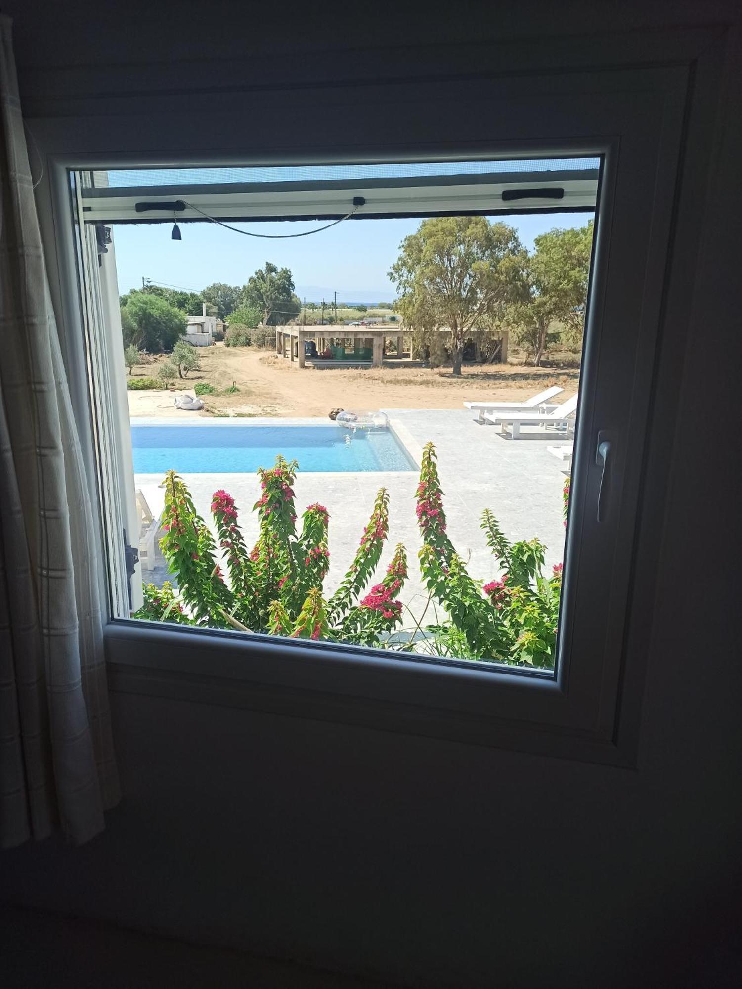 Andria'S Suites Chrisi Akti  Cameră foto